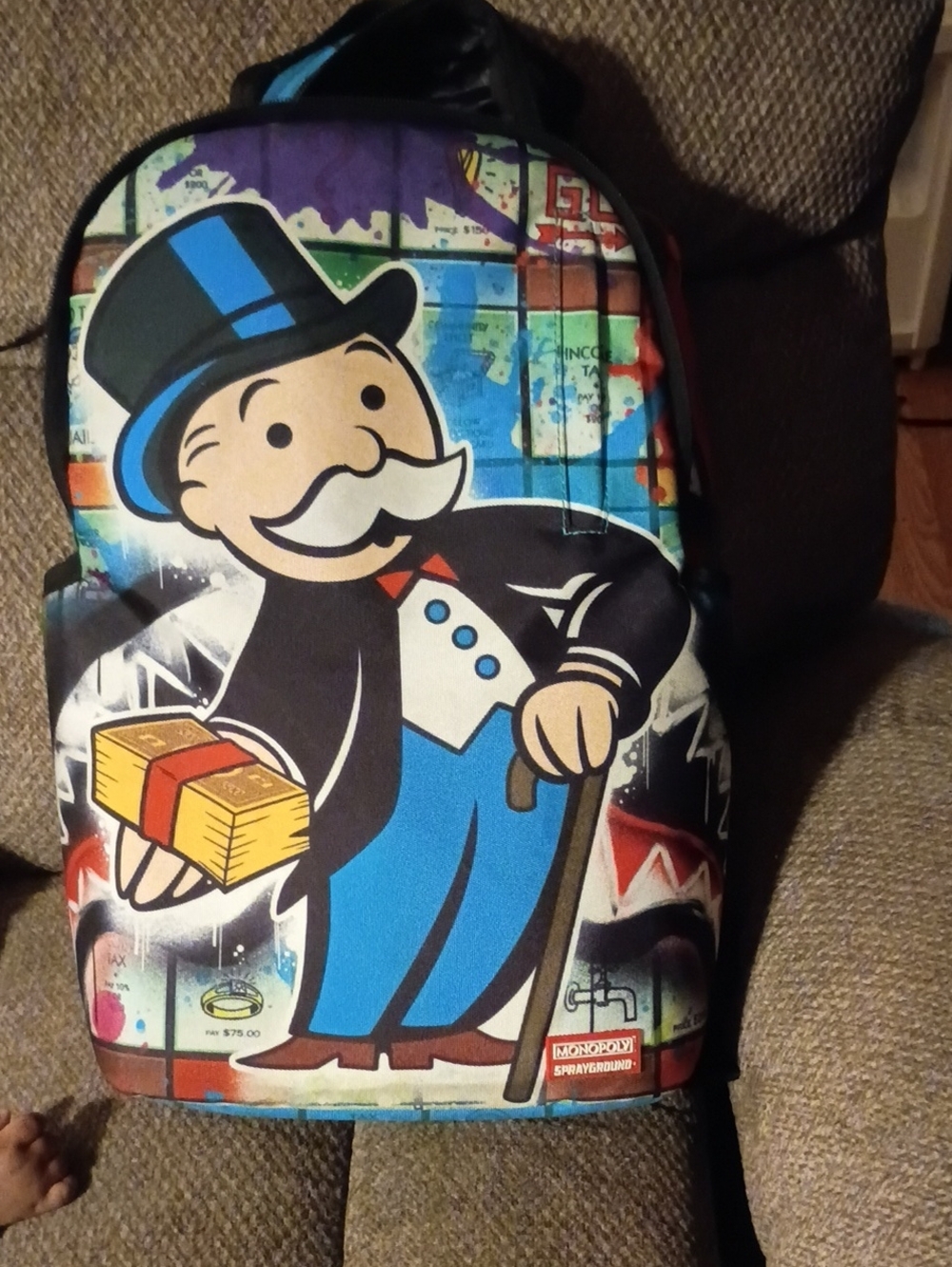 Sprayground Blue, Black and White Monopoly Character Backpack Print